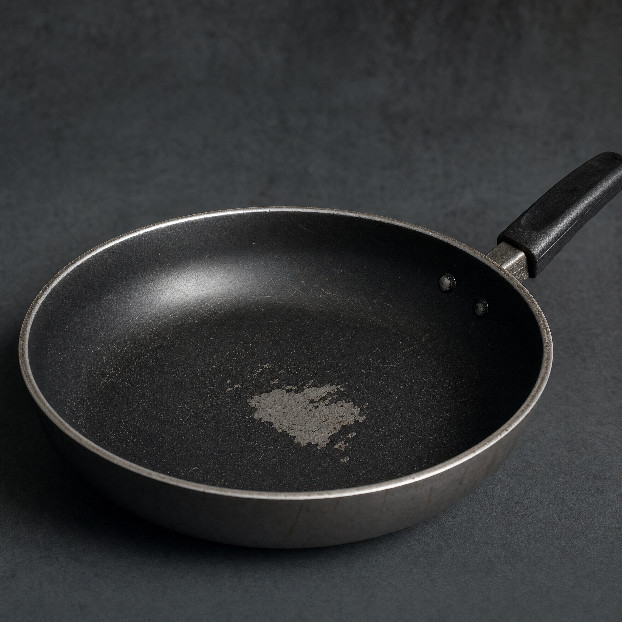 A worn non-stick surface after ordinary use